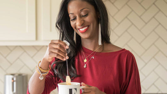 Marquita McCoy, the owner of Earthen Escapes and the creator of the best dark spot corrector, drinking her green tea